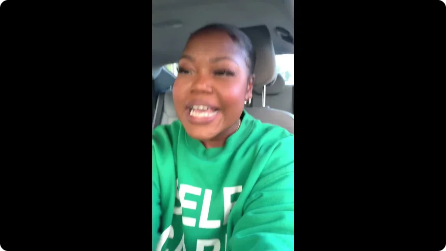 a boy in a green shirt